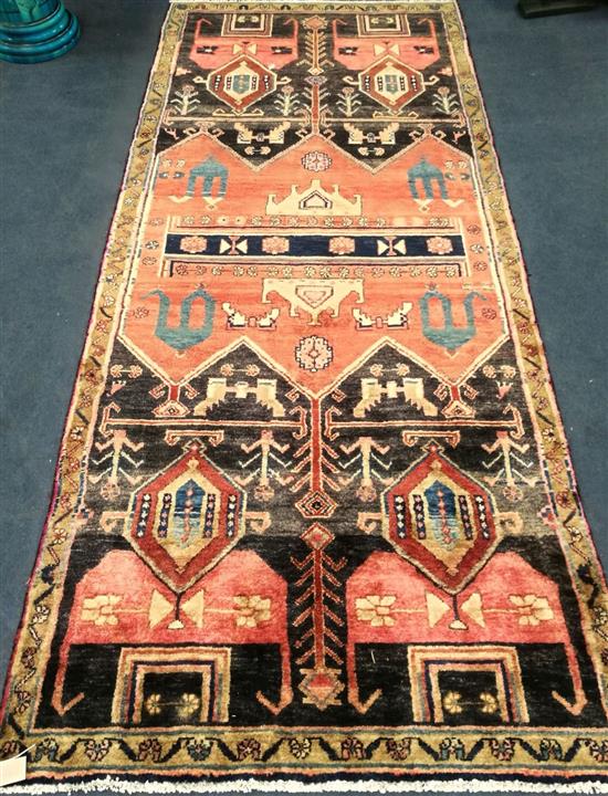 A Baluchi rug 245 x 110cm